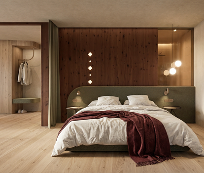 Camera da letto moderna con accogliente letto matrimoniale, illuminazione calda, elementi in legno e cabina armadio integrata.