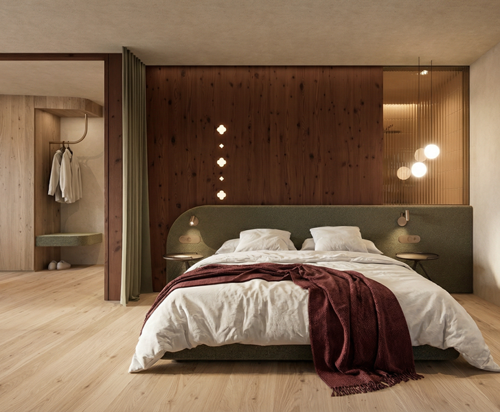 Modern bedroom with a cosy double bed, warm lighting, wooden elements and an integrated walk-in wardrobe.