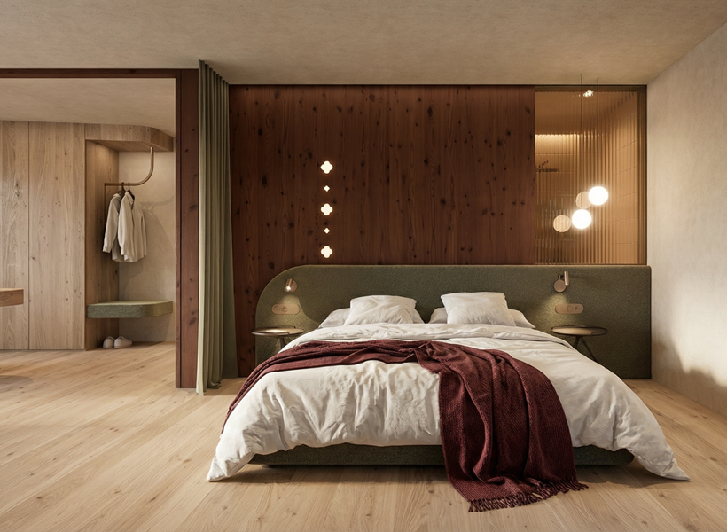 Modern bedroom with a cosy double bed, warm lighting, wooden elements and an integrated walk-in wardrobe.