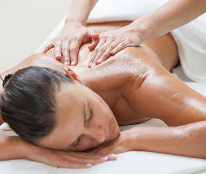 Woman during a relaxing back massage.