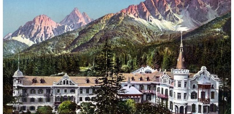 A postcard showing the Wildbad Innichen spa against the backdrop of the Dolomites